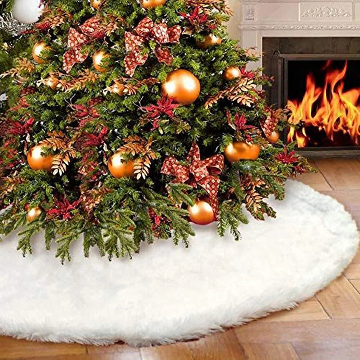 White plush tree skirt under a decorated Christmas tree