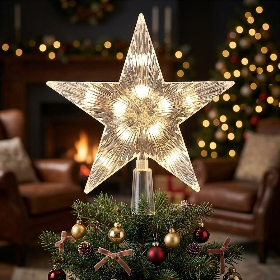 Clear LED star tree topper glowing on a decorated tree