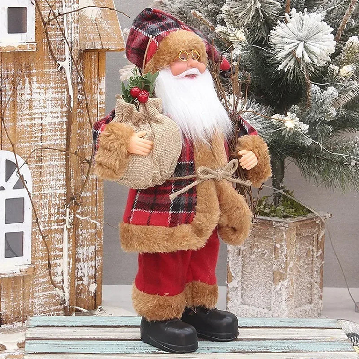 Woodcutter Santa figure with sack and plaid coat