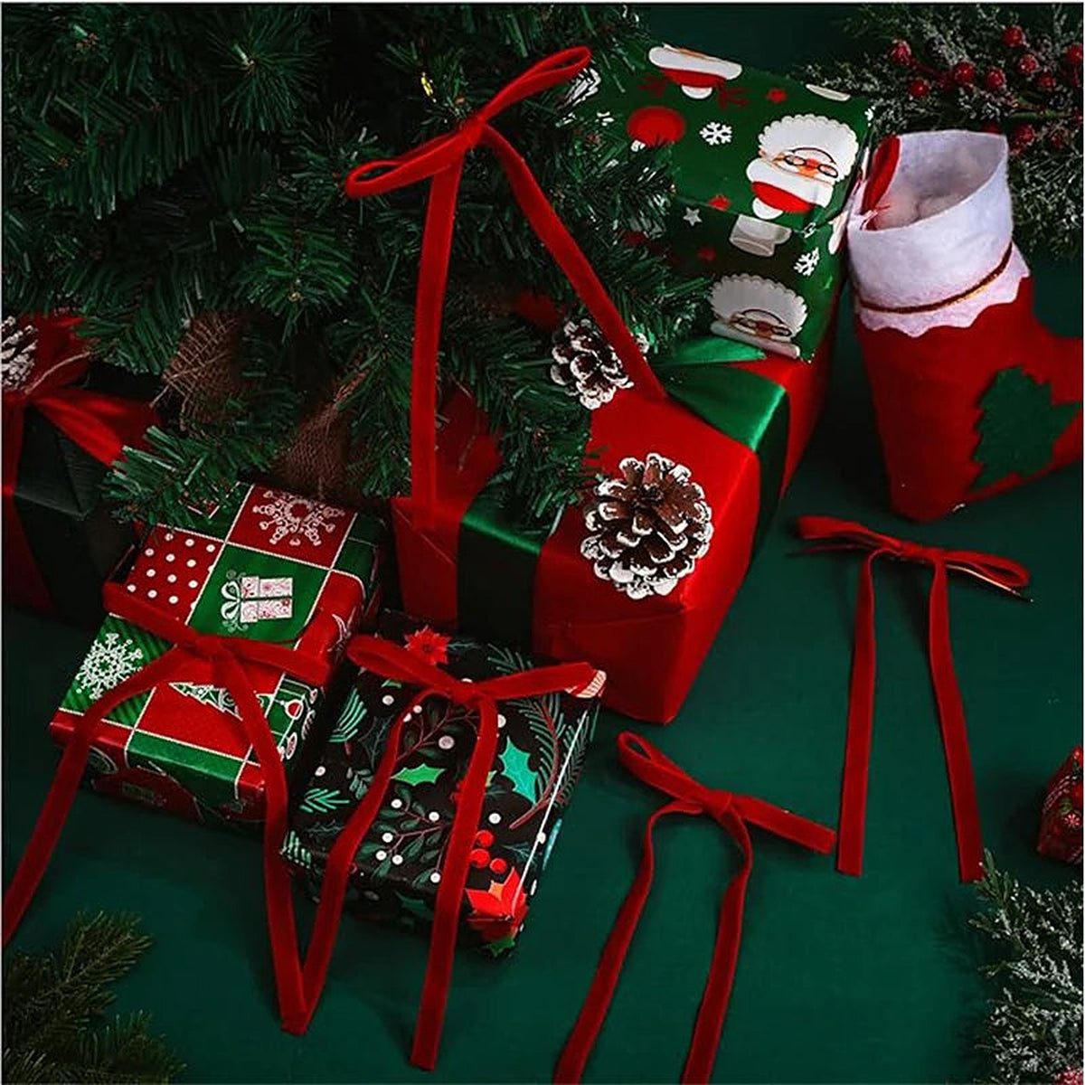 Red velvet bows on wrapped Christmas gifts
