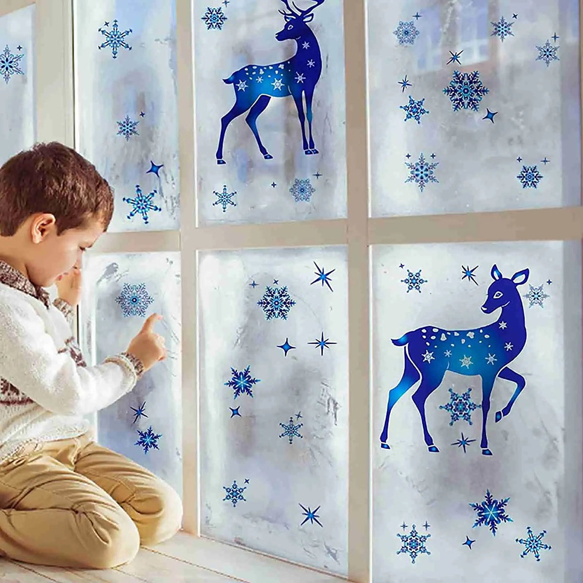 Reindeer window clings on a frosted window