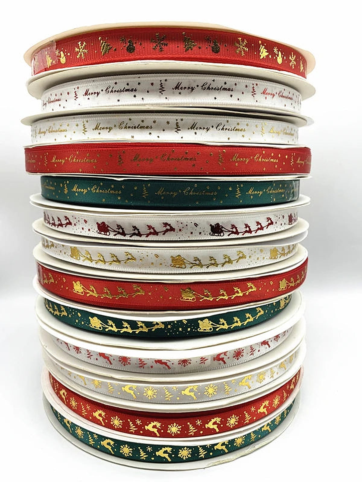 Tall stack of printed Christmas ribbon rolls