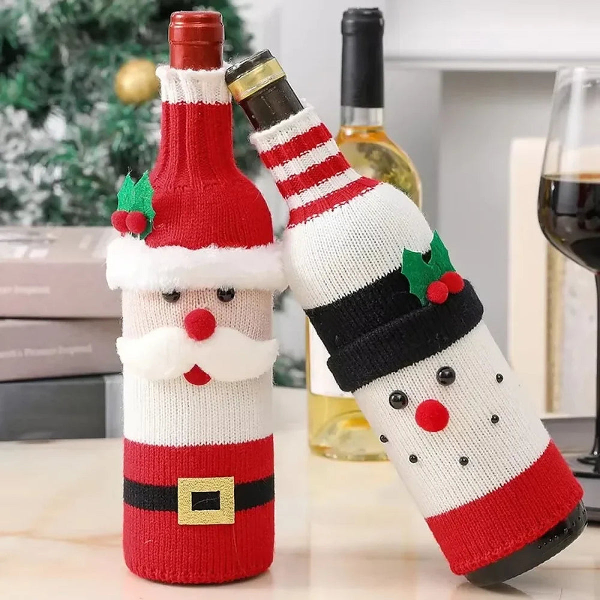 Santa and snowman knit covers on wine bottles