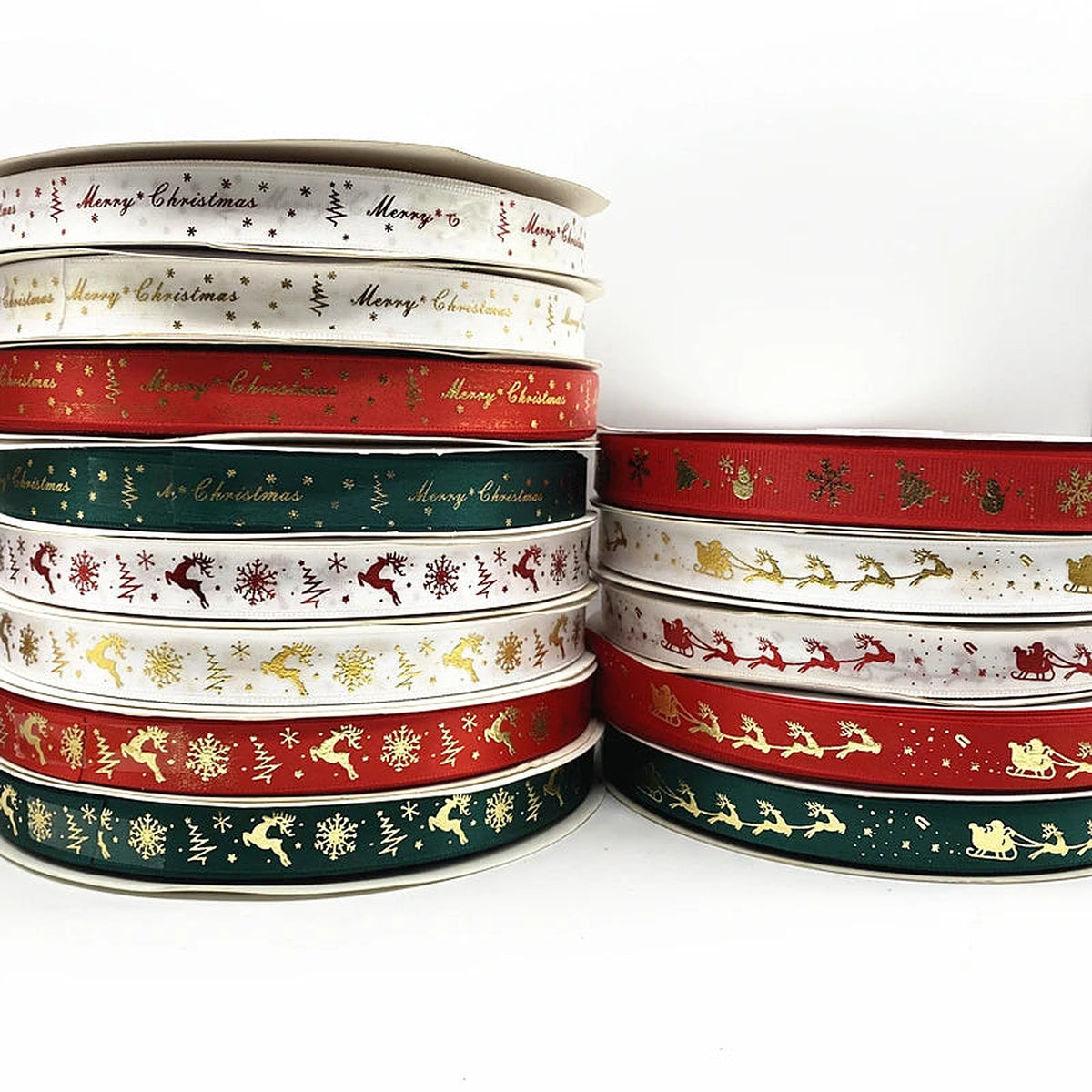 Rolls of printed Christmas ribbon in assorted designs