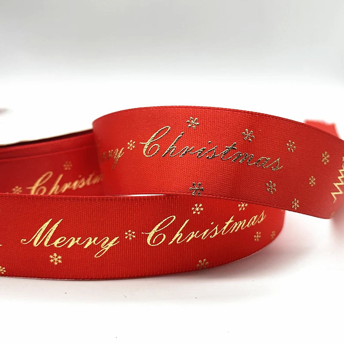 Red ribbon with gold Merry Christmas script