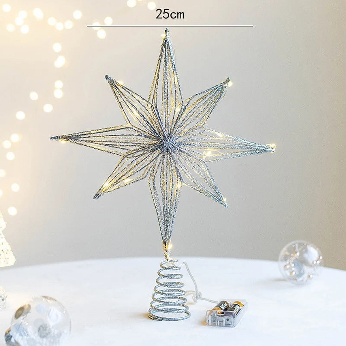 Silver 8-point star tree topper, 25 cm wide