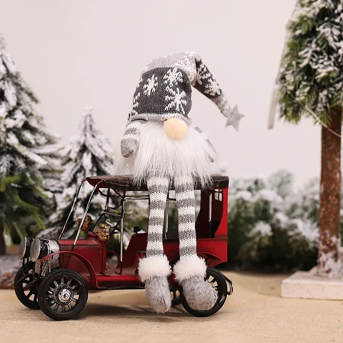 Grey snowflake-hat gnome with long legs