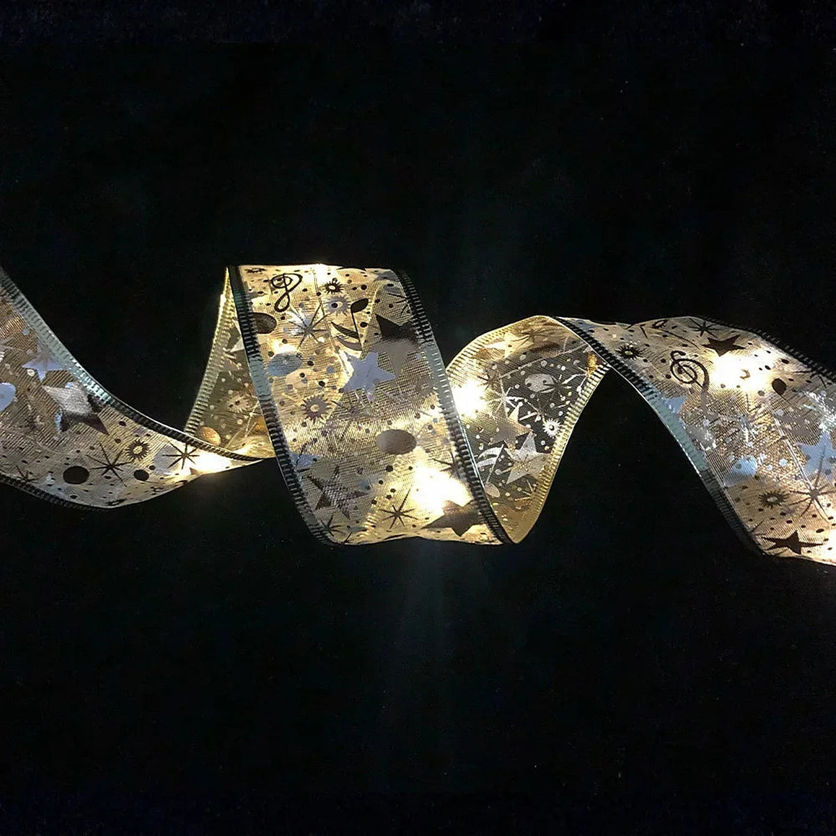 Glowing LED ribbon light on a dark background