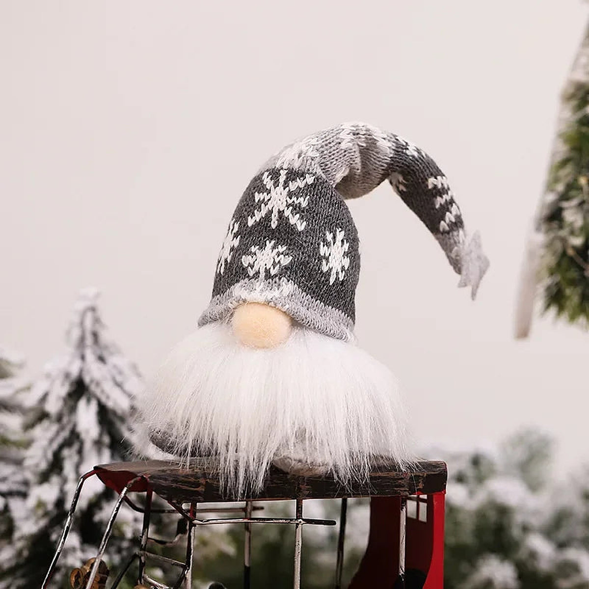 Short grey snowflake-hat gnome