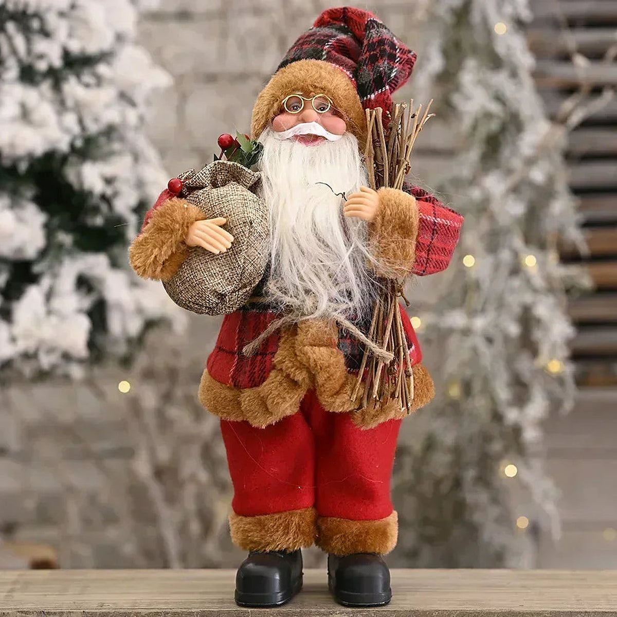 Woodcutter Santa figure with sack and firewood