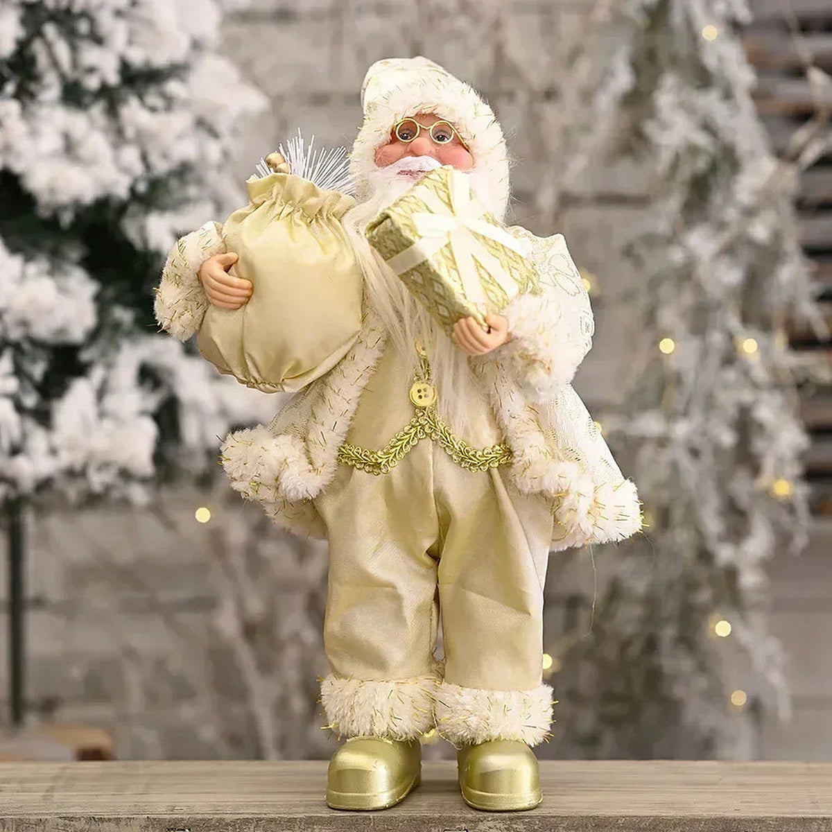 Cream Santa figure holding a gift