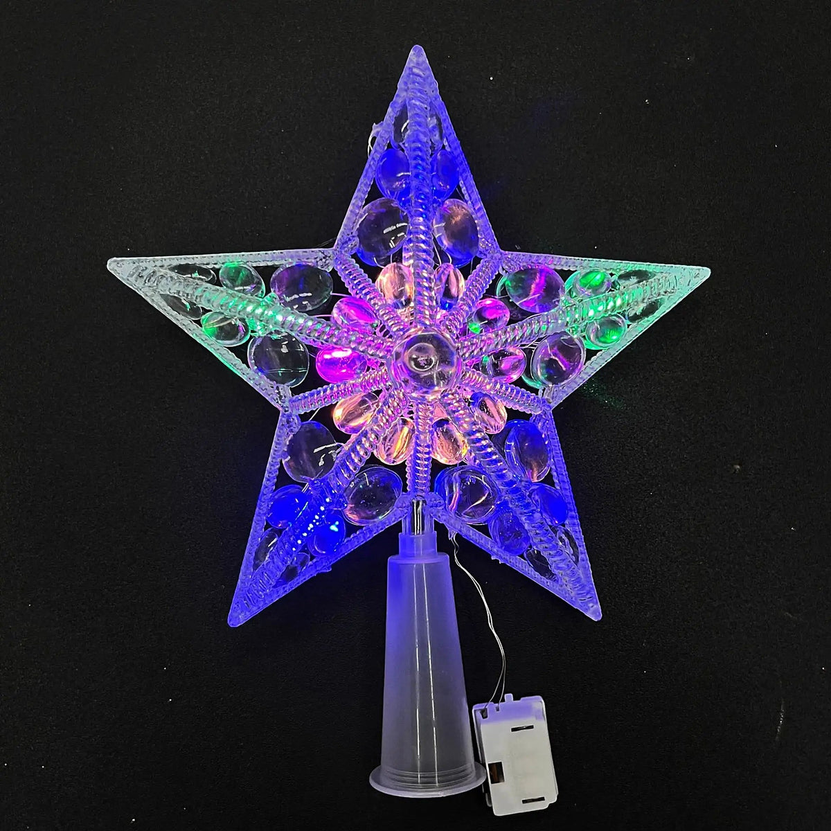 Clear star tree topper with colorful jewel center