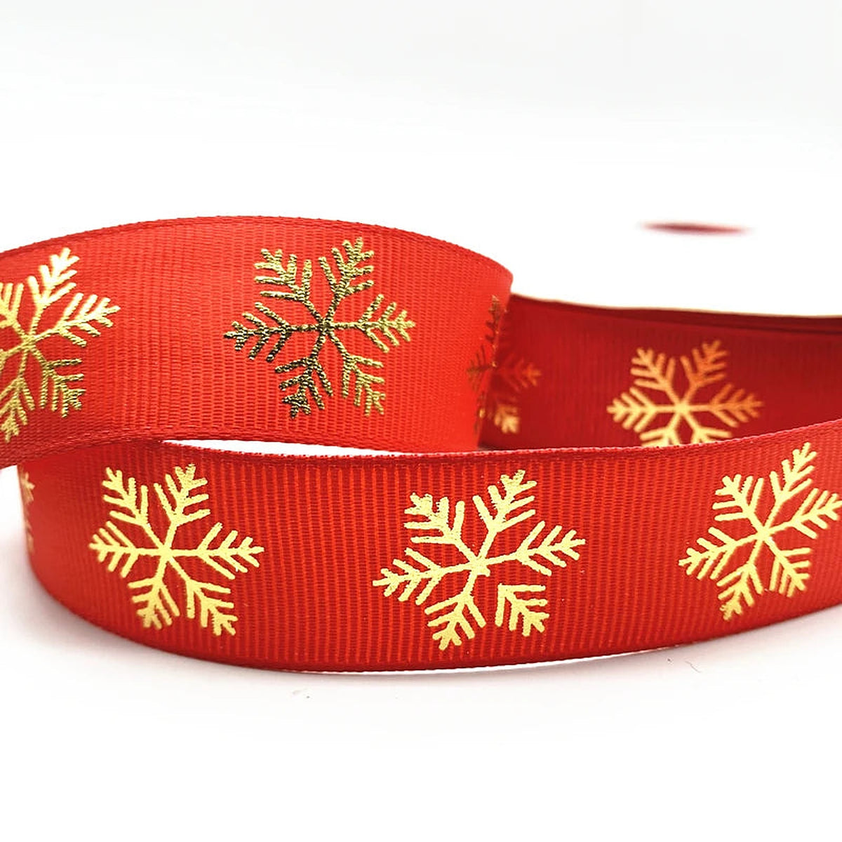 Red grosgrain ribbon with gold snowflakes