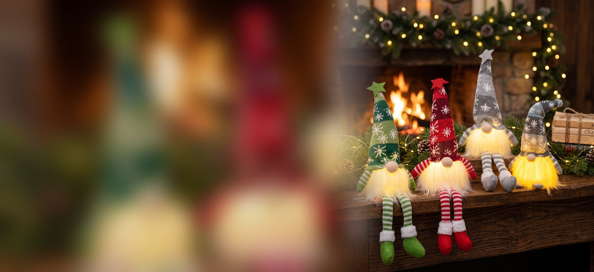 Light-up knitted gnomes sitting on a fireplace mantel decorated with a lit garland